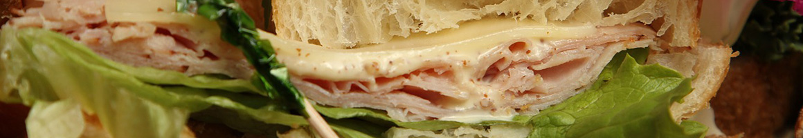 Eating Deli Sandwich at Bright Bay restaurant in Bay Shore, NY.